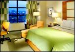 an over-sized guestroom including high-speed Internet access, data port, dual phones, and refreshment center at the Renaissance in Vegas