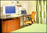 Renaissance guestroom with spacious work desk, flat screen TV and other high-tech amenities